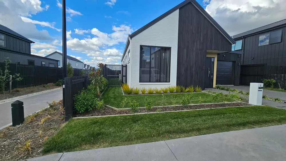 A landscaped front garden and lawn at a new-build house